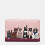 Pink leather bifold purse with appliqué cat design - front view