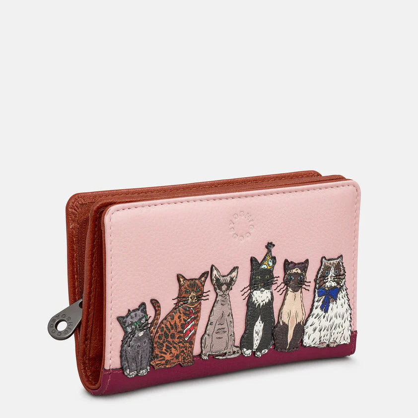 Pink leather bifold purse with appliqué cat design - front view