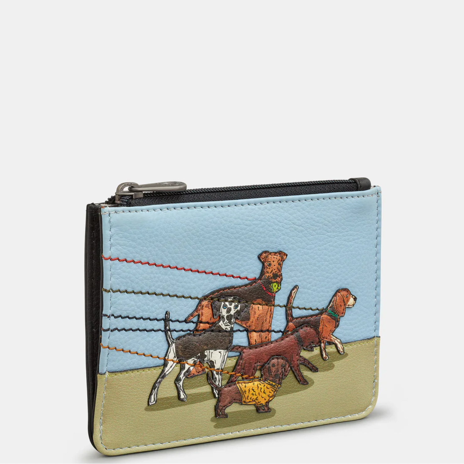 Coin purse with dog illustration on a light blue background
