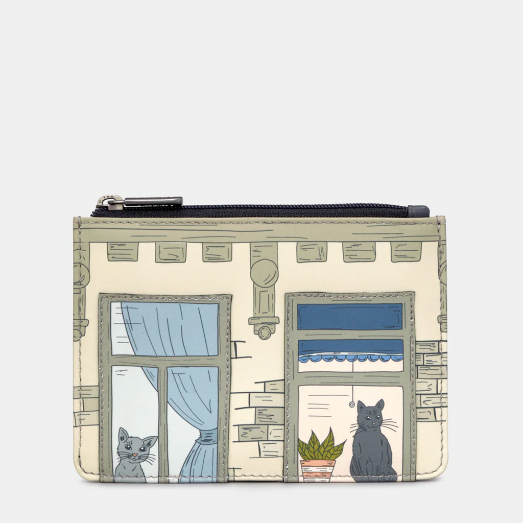 Coin purse with cat-themed design on a white background