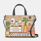 Handbag with a design of a living room scene on a beige background