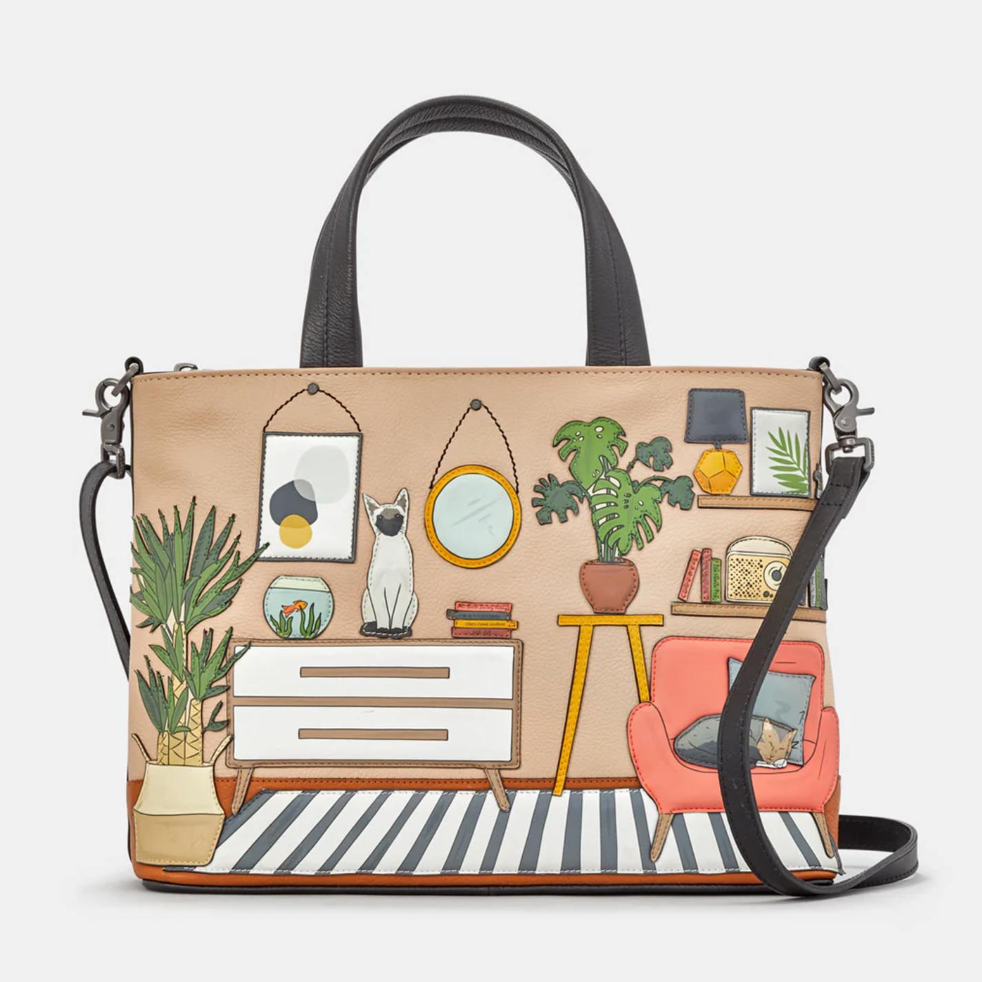 Handbag with a design of a living room scene on a beige background