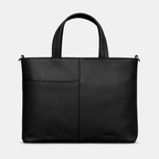 Black leather tote bag on a light gray background