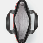 Inside Black leather handbag with red accents on a white background