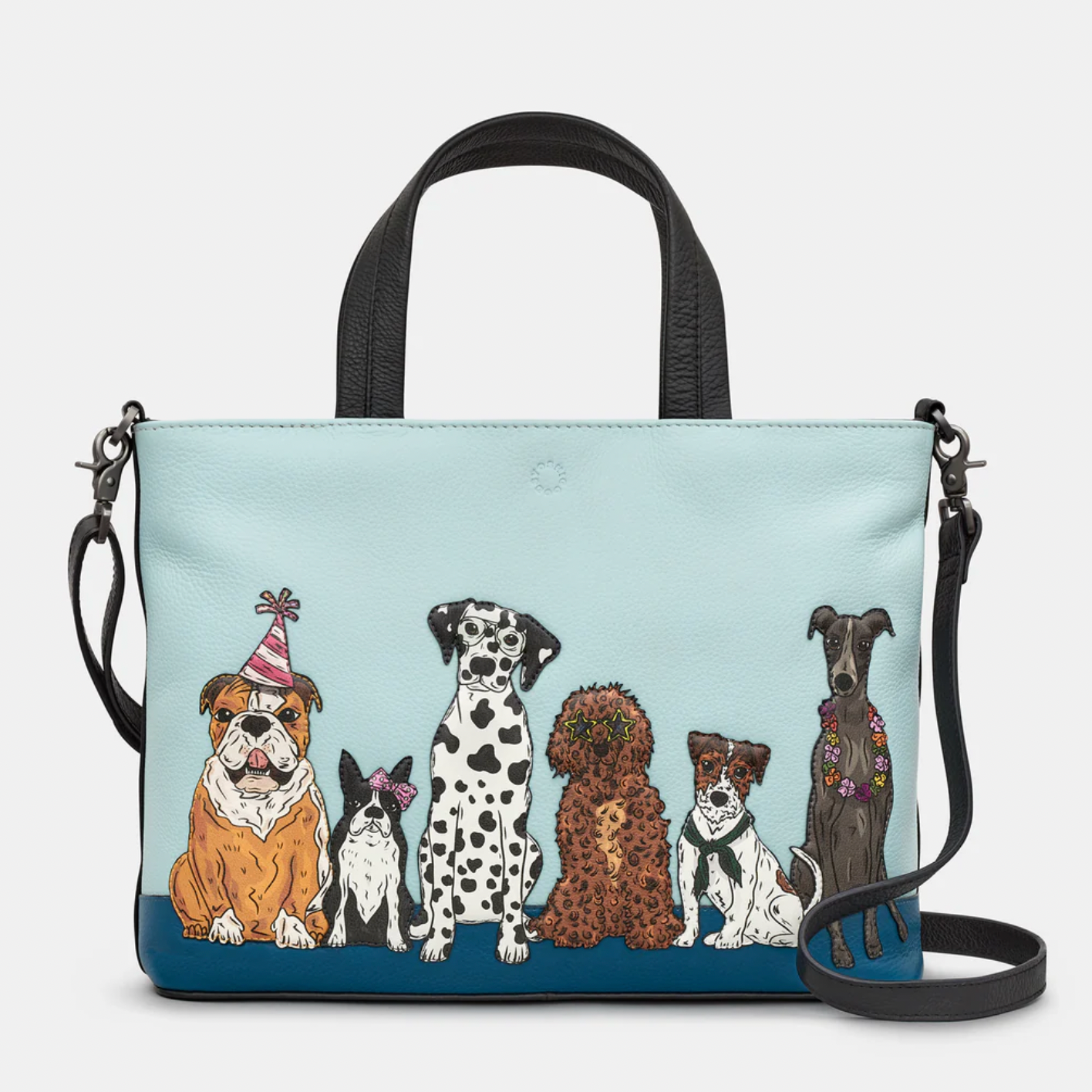Handbag with illustrations of dogs on a light blue background