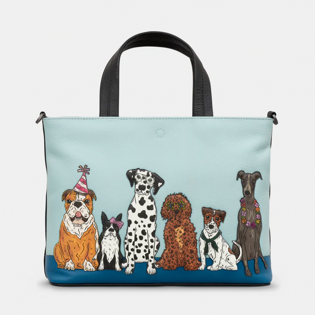 Multiway bag with illustrations of dogs on a light blue background