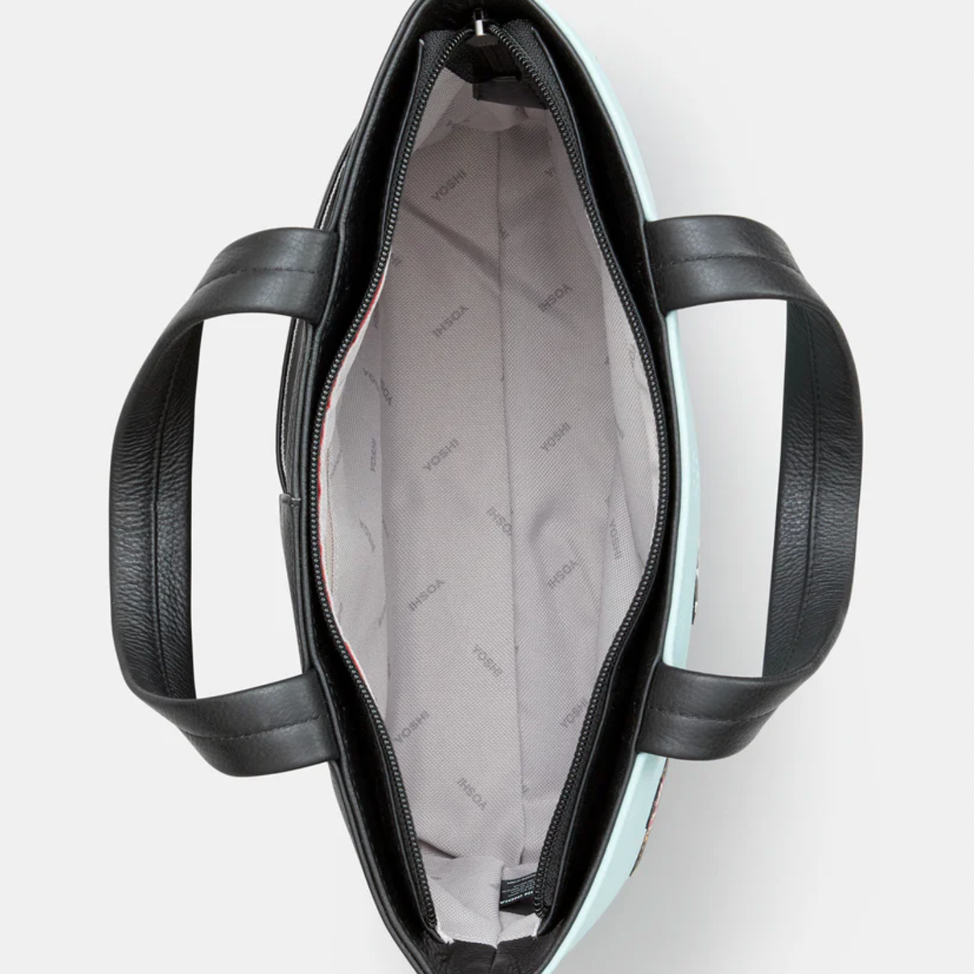 Black leather handbag with a patterned interior on a white background