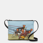 Leather crossbody bag with appliqué dog walk design in blue, green and brown.