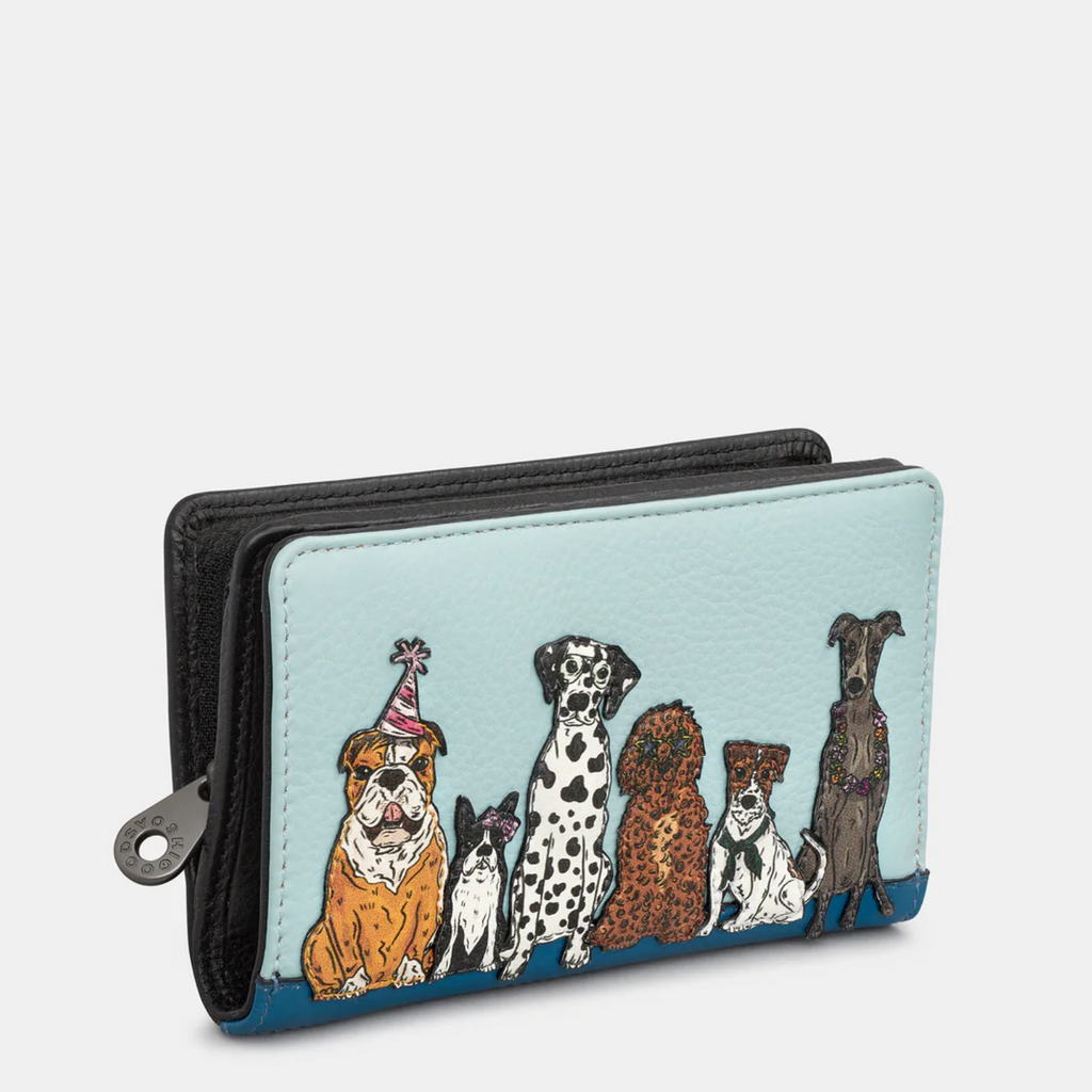 Blue leather bifold purse with appliqué dog design - front view