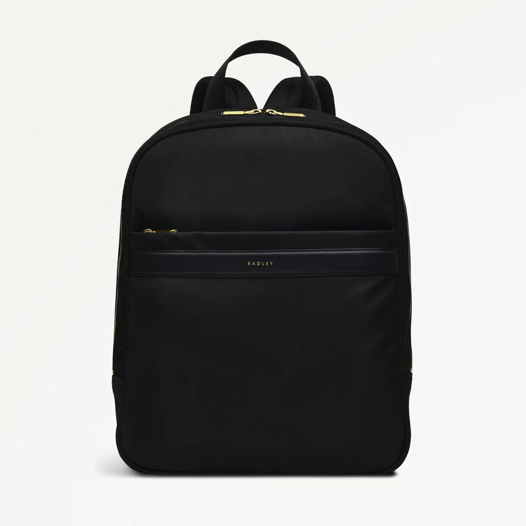 Black backpack on a light gray background