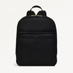 Black backpack on a light gray background