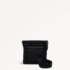 Black crossbody bag with a strap on a white background