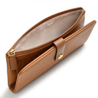 Tan leather wallet with a gold emblem on a white background